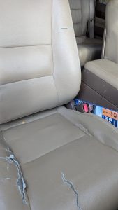 LSEAT leather seat cover showing cracking and peeling